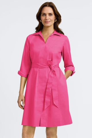 Front view of the Agnes Stretch Matte Sateen 3/4 Sleeve Dress worn with the self tied belt and models hand in functioning pocket #color_pink flambe
