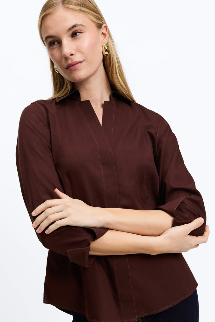 Woman with folded arms wearing the Taylor pinpoint 3/4 sleeve shirt in #color_chicory coffee