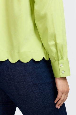 Close up view on the scalloped hem and triple pleated cuffs of the Scarlett Plus Stretch Matte Sateen Long Sleeve Shirt
#color_chartreuse