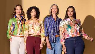Plus-size woman in Foxcroft shirts, styled with sleek pants for modern polish.