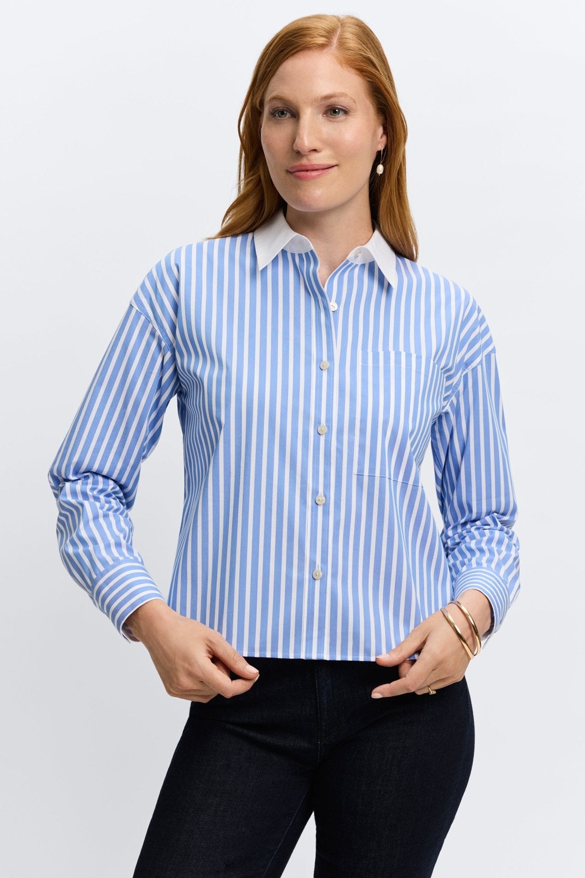 Light blue Foxcroft striped shirt, crafted from no-iron fabric for functionality and refined fashion.