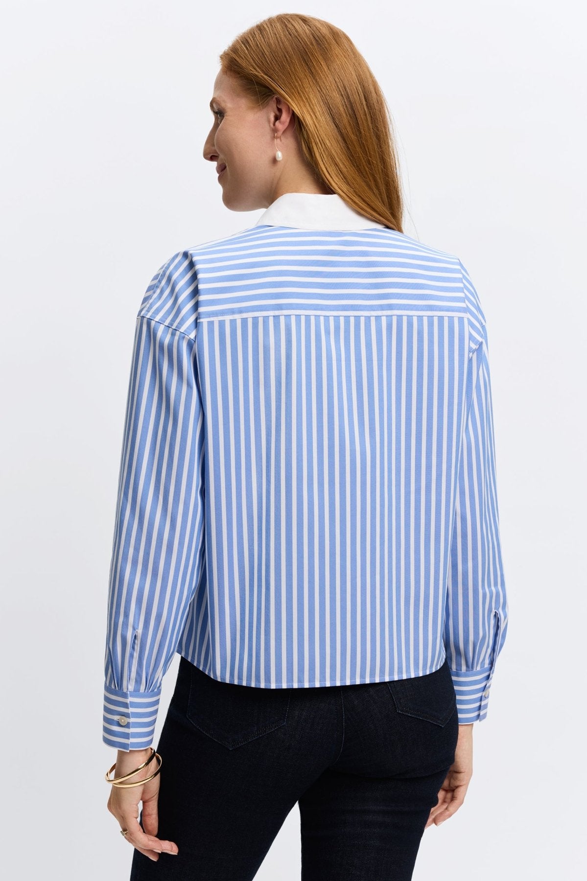 Light blue Foxcroft striped shirt, crafted from no-iron fabric for functionality and refined fashion.