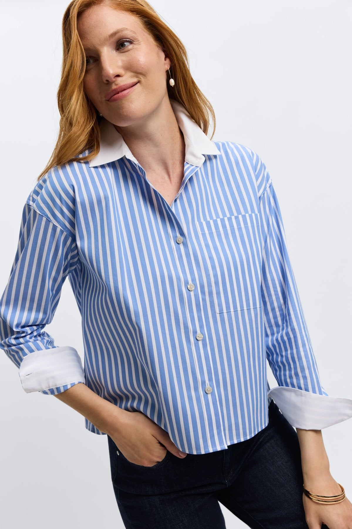 Light blue Foxcroft striped shirt, crafted from no-iron fabric for functionality and refined fashion.