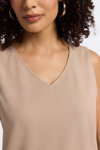 Close-up of the v-neck of the Callie reversible sleeveless tank in #color_khaki