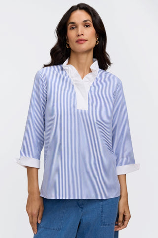 Front view of the 3/4 sleeve popover shirt worn untucked and a closed neckline #color_powder blue pinpoint stripe