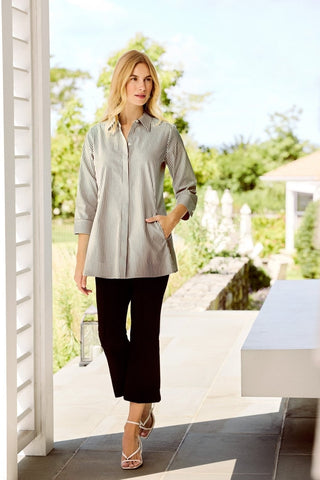 Woman outdoors wearing the 100% cotton Cici pinpoint striped tunic in #color_black pinpoint stripe