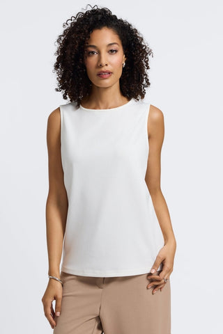 Woman wearing the classic scoop neck side of the Callie knit crepe reversible tank in #color_ecru