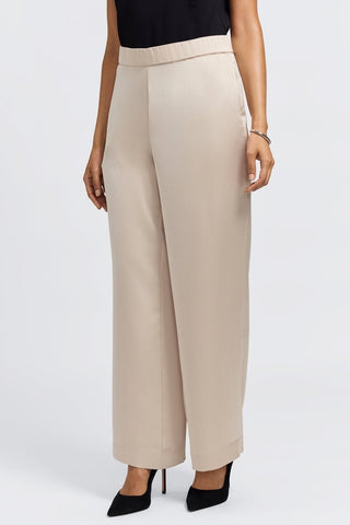 Angled front view of the full length satin trousers and elastic waistband #color_champagne