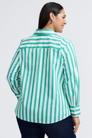Plus-sized woman in a button down shirt with kelly green stripes, designed in a flattering fit that transitions from work to weekend.