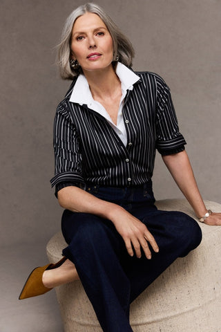 Ricki knit-woven sleeveless layering tank styles with a black shirt