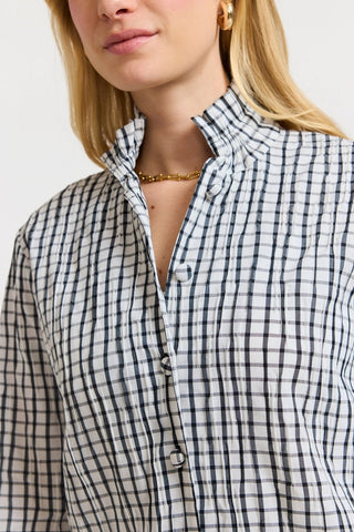 Close up of the ruffled neck an windowpane print of the 3/4 sleeve shirt #color_White/Black