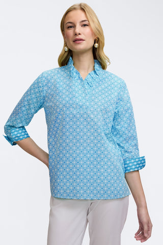 Front view of model wearing the Tammy Petite Geo Lattice 3/4 Sleeve Popover Shirt matched with a pair of white pants #color_blue/white geo lattice