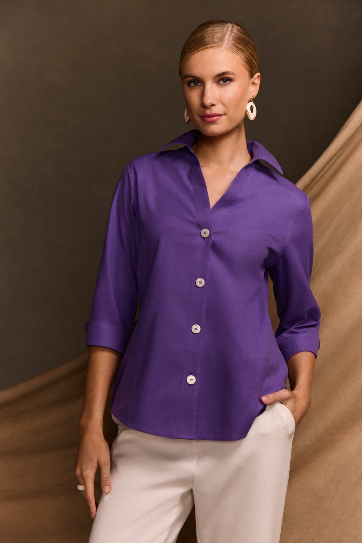 Woman in Foxcroft Paityn royal purple 3/4 sleeve shirt with polished ease