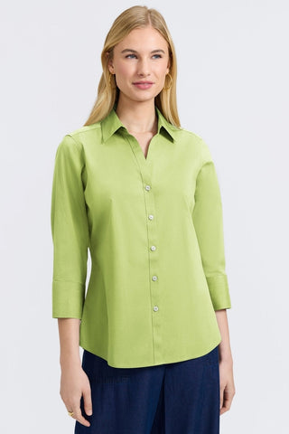 Front view of a woman wearing the Mary No Iron Stretch 3/4 Sleeve Shirt #color_celery