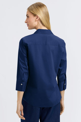 Back view of a woman wearing the Mary No Iron Stretch 3/4 Sleeve Shirt #color_navy