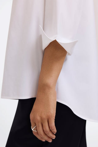 Close-up of the 3/4 sleeve on the Therese popover shirt in white