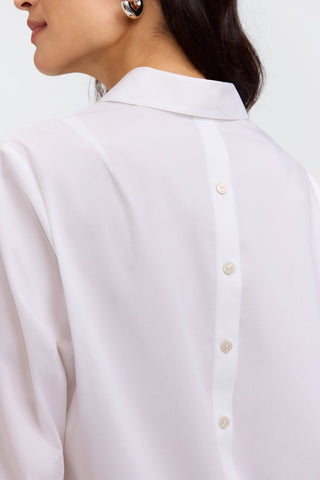 Rear view of the Therese 3/4 sleeve popover shirt in white