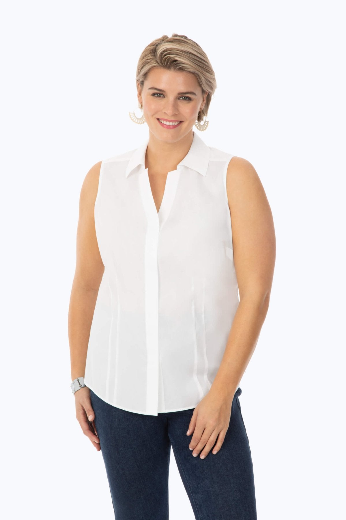 Plus-size woman wearing a Taylor Plus Essential Stretch Non-Iron Sleeveless Shirt by Foxcroft, styled with sleeveless design for modern wrinkle-free fashion.