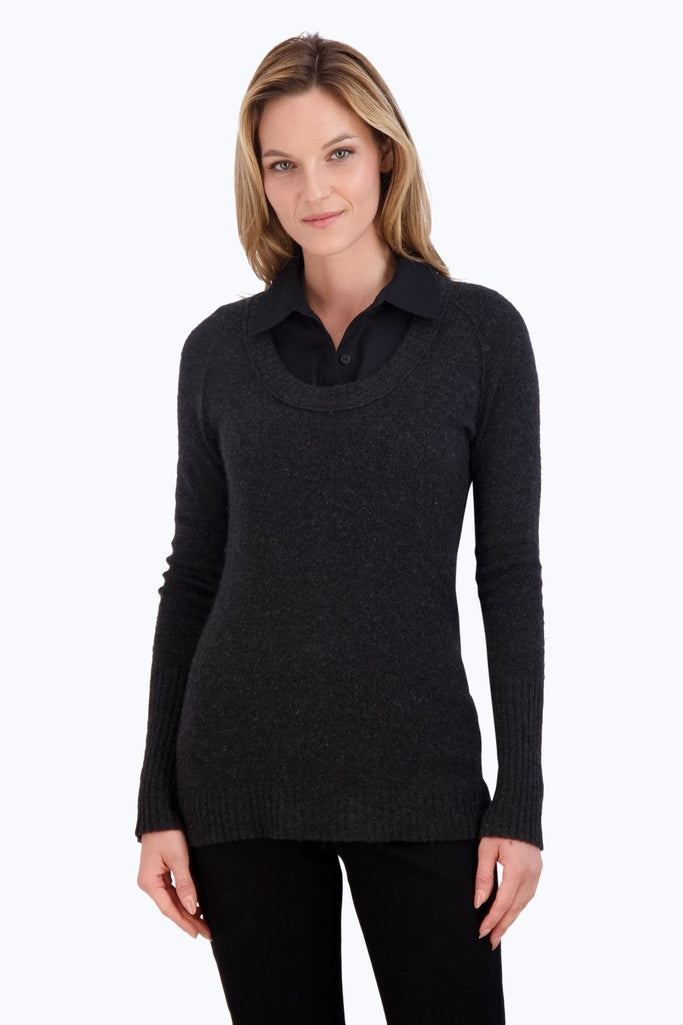 Ricki sleeveless tank layered with a knit sweater #color_black