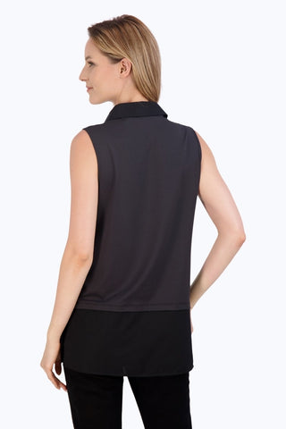 Back view of Sasha Knit-Woven Sleeveless Layering Tunic worn with black pants #color_black