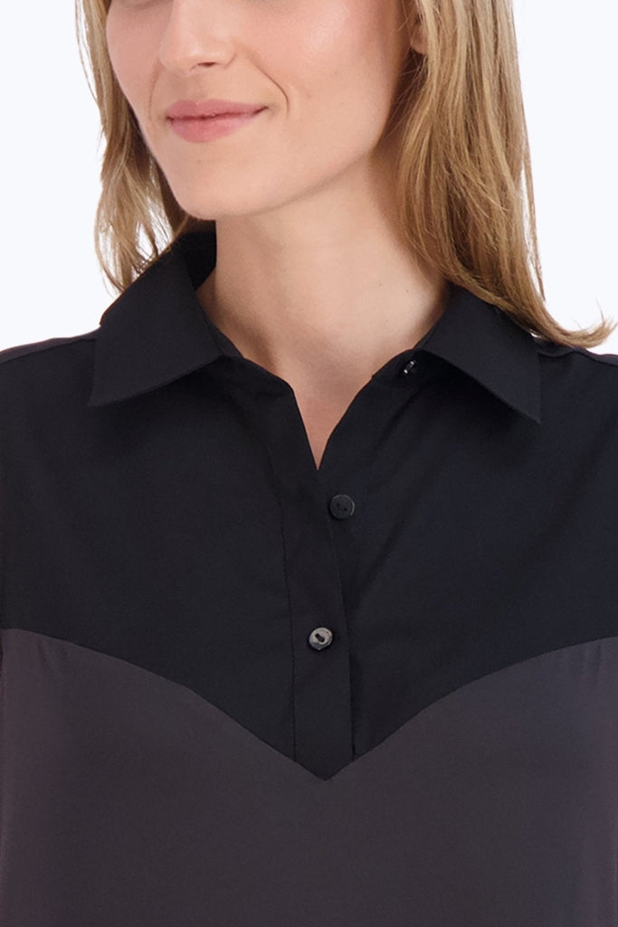 Straight on close up of buttoned collar of the Sasha Knit-Woven Sleeveless Layering Tunic #color_black