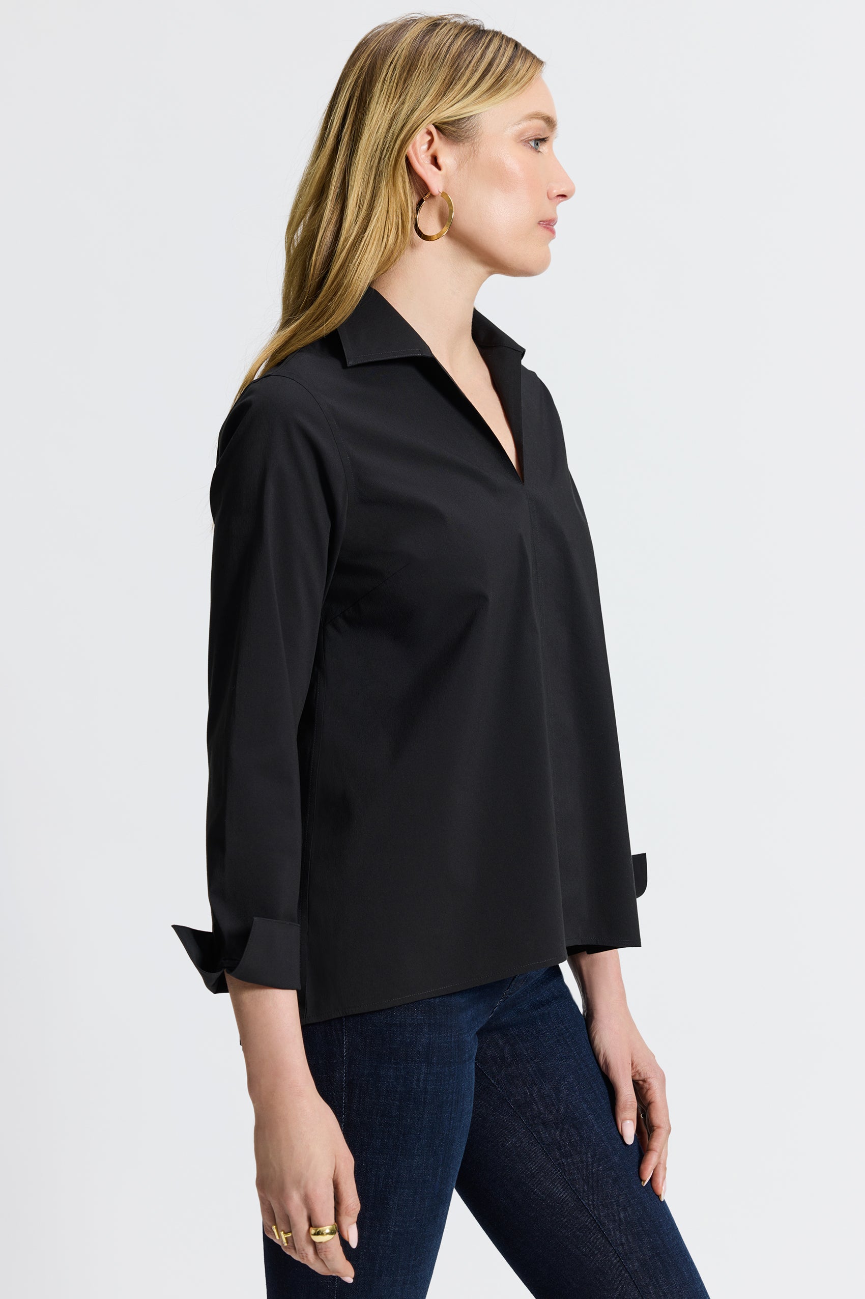 #color_black  Foxcroft Agnes black no-iron shirt styled on a woman with classic fit and versatile appeal.