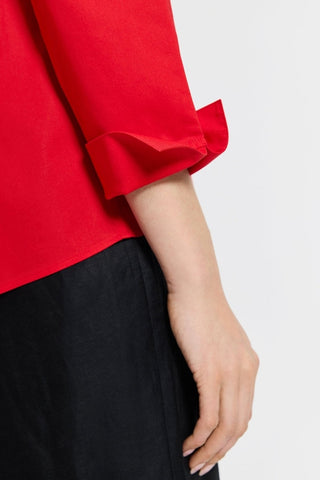 Close-up of the sleeves and flip back cuffs of the Agnes popover shirt #color_simply red