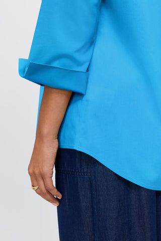 Close up of one of the 3/4 sleeves of the Therese No Iron Stretch Popover Shirt #color_malibu blue