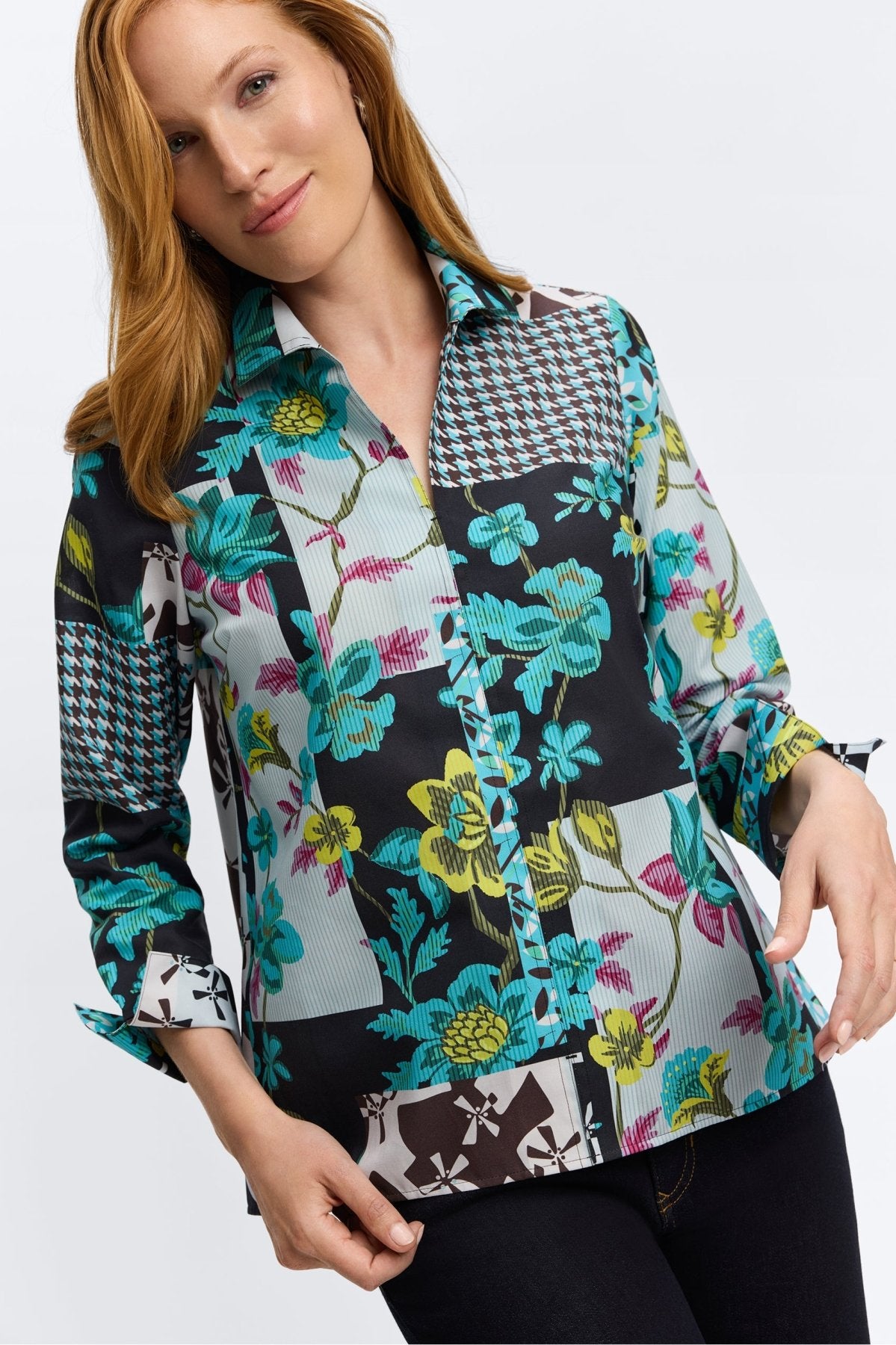 Woman wearing Foxcroft teal multi-print blouse with flattering fit