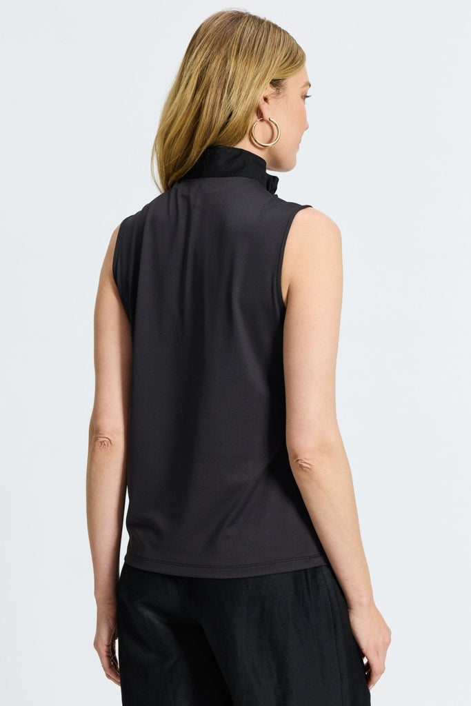 Angled back view of Tammy Knit-Woven Ruffle Collar Sleeveless Layering Tank #color_black