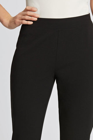Close up on the knit crepe fabric of the pants #color_black