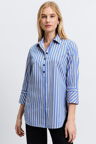 Foxcroft no-iron shirt with in blue stripes, worn by a model embracing chic, low-maintenance style.
