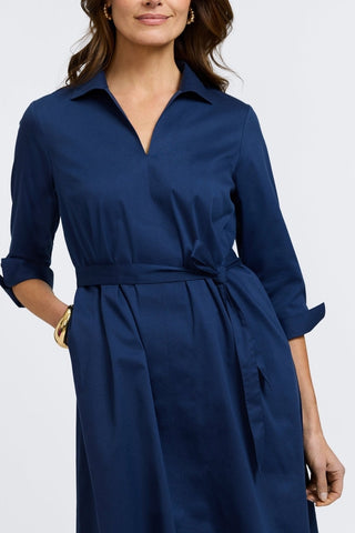 Front view showing the winged collar and the self tied belt of the Agnes Stretch Matte Sateen 3/4 Sleeve Dress #color_navy
