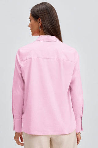 Back view of a woman wearing the Bella No Iron Stretch Long Sleeve Shirt
#color_bubblegum