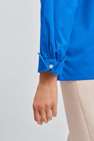 Close up view of the folded cuff on the sleeve of the Bella No Iron Stretch Long Sleeve Shirt #color_cobalt blue
