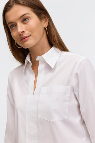 Close up front view of the oversized pocket and neckline of the Bella No Iron Stretch Long Sleeve Shirt #color_white