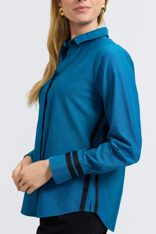 Angled side view of a woman wearing the  Brooke No Iron Pinpoint Long Sleeve Shirt #color_teal 