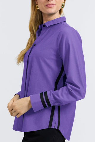 Angled side view of woman wearing the  Brooke No Iron Pinpoint Long Sleeve Shirt with bent arms #color_royal purple