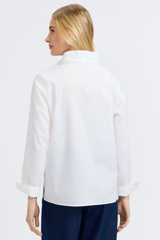 Back view of a woman wearing the Tammy No Iron Stretch Long Sleeve Popover Shirt #color_white