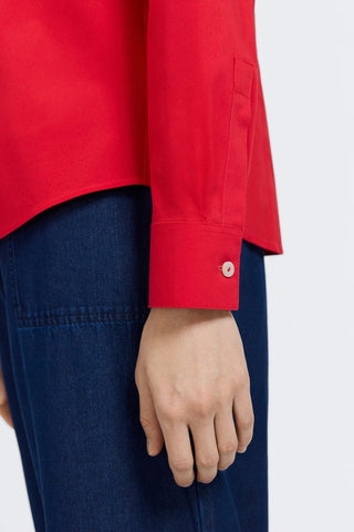 Close up front view of the sleeve and buttoned cuff on the June No Iron Stretch Long Sleeve Shirt #color_simply red