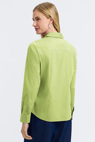 Angled back view of woman wearing the June No Iron Stretch Long Sleeve Shirt #color_celery