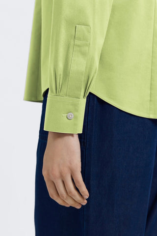 Zoomed in view of the sleeve and buttoned cuff of the June No Iron Stretch Long Sleeve Shirt #color_celery
