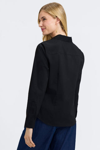Angled back view of women wearing the June No Iron Stretch Long Sleeve Shirt #color_black
