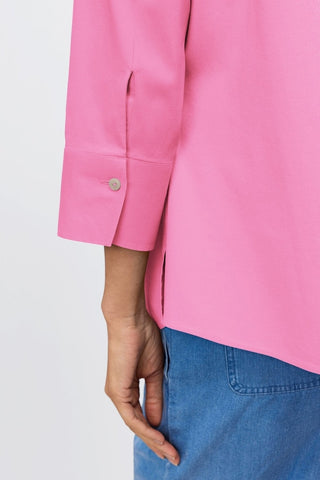 Zoomed in view on the 3/4 sleeve and shell buttoned cuff of the Mary No Iron Stretch 3/4 Sleeve Shirt  #color_guava pink