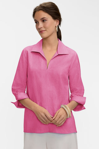 A model wearing the Agnes Solid Linen Blend 3/4 Sleeve Shirt showing the signature flip back cuffs #color_cosmo pink