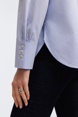 Long sleeve and button cuff of the Kris tunic #color_blue wave