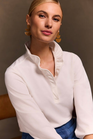 Woman sitting wearing the Tammy Knit Crepe 3/4 Sleeve Popover Shirt #color_ecru