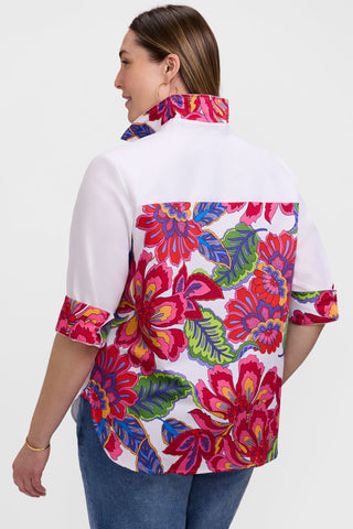 Back view of the Meghan Plus Paradise Blooms 3/4 Sleeve Shirt worn with the collar popped and sleeves rolled to show the contrast pattern featured 