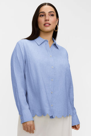 Front view of model wearing the Scarlett Plus Solid Linen Blend Long Sleeve Shirt