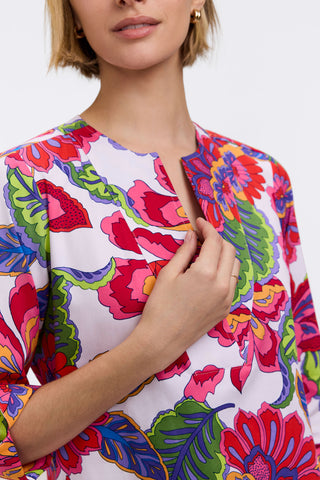 Close up of the deep view neckline featured in the Vena Paradise Blooms 3/4 Sleeve Dress